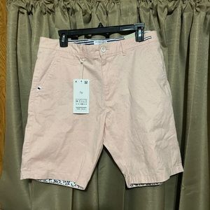 pink denim shorts with blue dots